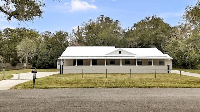 616 SE 31st Ter, Ocala, FL 34471 - view of front of property with concrete driveway and metal roof