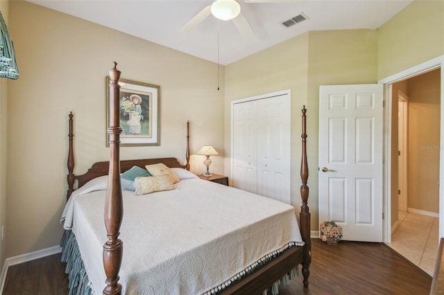 155 Cape Florida Dr, Poinciana, FL 34759 - bedroom featuring a closet, baseboards, visible vents, and wood finished floors
