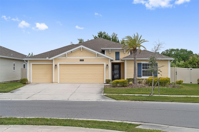 1848 Ancestry Trl, Kissimmee, FL 34746 - view of front of house with a garage and concrete driveway