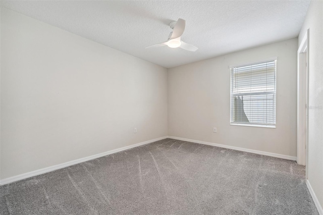 1848 Ancestry Trl, Kissimmee, FL 34746 - carpeted empty room with a textured ceiling and ceiling fan