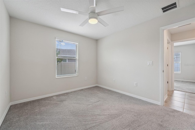 1848 Ancestry Trl, Kissimmee, FL 34746 - carpeted empty room featuring a ceiling fan and baseboards