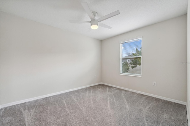1848 Ancestry Trl, Kissimmee, FL 34746 - spare room with carpet flooring and a ceiling fan