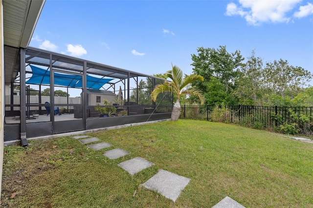 1848 Ancestry Trl, Kissimmee, FL 34746 - fenced backyard with a patio area and a lanai