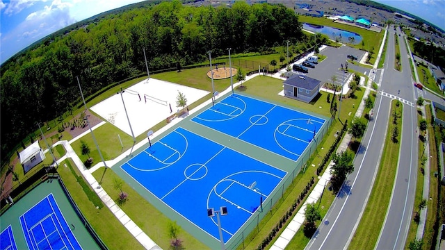 1848 Ancestry Trl, Kissimmee, FL 34746 - view of sport court featuring community basketball court, a wooded view, and volleyball court
