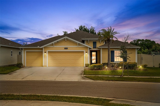 1848 Ancestry Trl, Kissimmee, FL 34746 - view of front of home with an attached garage and concrete driveway