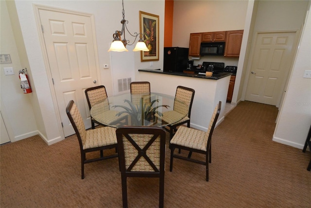 8100 Poinciana Blvd Unit 2111, Orlando, FL 32821 - carpeted dining space featuring baseboards and visible vents