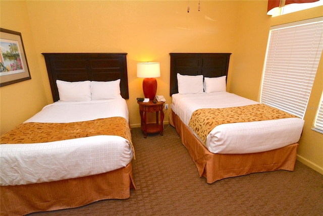 8100 Poinciana Blvd Unit 2111, Orlando, FL 32821 - bedroom featuring baseboards and carpet