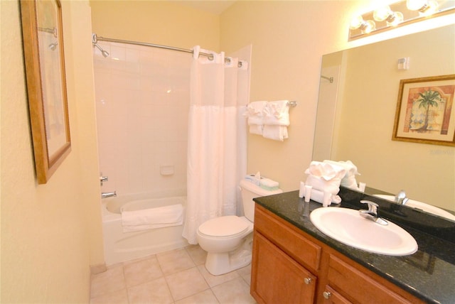8100 Poinciana Blvd Unit 2111, Orlando, FL 32821 - bathroom featuring tile patterned floors, shower / tub combo, toilet, and vanity