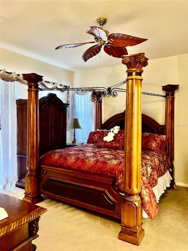 2920 River Birch Dr, Kissimmee, FL 34741 - carpeted bedroom with baseboards and ceiling fan