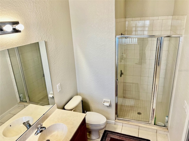 2920 River Birch Dr, Kissimmee, FL 34741 - full bathroom featuring a stall shower, tile patterned floors, toilet, and a textured wall