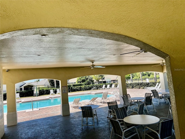 2920 River Birch Dr, Kissimmee, FL 34741 - community pool featuring fence, ceiling fan, and a patio