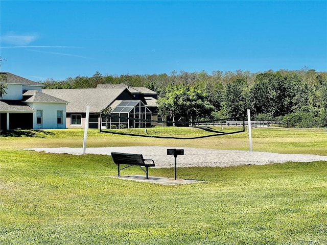 2920 River Birch Dr, Kissimmee, FL 34741 - view of community featuring a yard and volleyball court