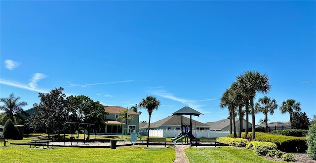 2920 River Birch Dr, Kissimmee, FL 34741 - view of property's community featuring fence, playground community, and a yard