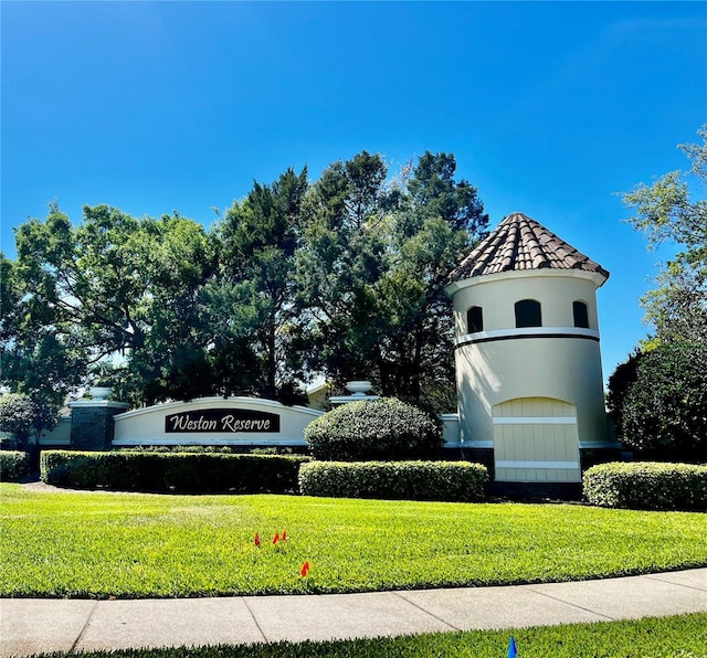 2920 River Birch Dr, Kissimmee, FL 34741 - community sign featuring a lawn