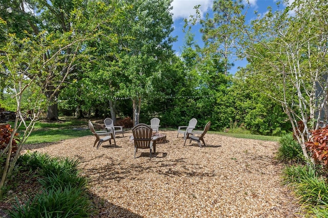 1999 Sir Lancelot Cir, Saint Cloud, FL 34772 - view of yard with an outdoor fire pit