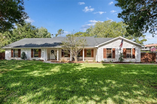 1999 Sir Lancelot Cir, Saint Cloud, FL 34772 - ranch-style home featuring fence, brick siding, and a front yard