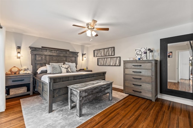 1999 Sir Lancelot Cir, Saint Cloud, FL 34772 - bedroom with wood finished floors, a ceiling fan, and baseboards