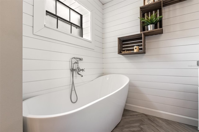 1999 Sir Lancelot Cir, Saint Cloud, FL 34772 - full bathroom featuring a soaking tub and wood walls