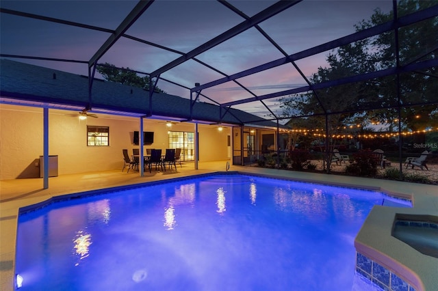 1999 Sir Lancelot Cir, Saint Cloud, FL 34772 - outdoor pool featuring outdoor dining area, a patio, ceiling fan, and glass enclosure
