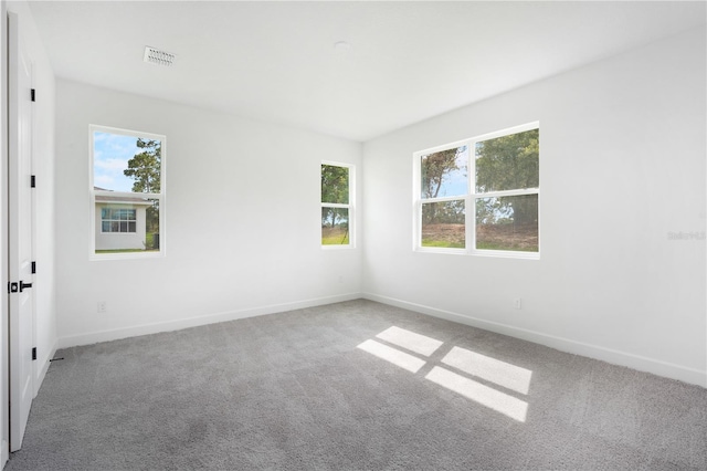 9143 Players Dr, Weeki Wachee, FL 34613 - unfurnished room with carpet floors and baseboards
