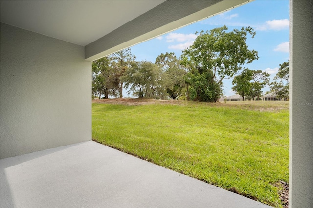 9143 Players Dr, Weeki Wachee, FL 34613 - view of green lawn with a patio