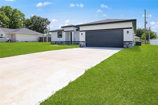 370 Marion Oaks Crse, Ocala, FL 34473 - view of front of house with stucco siding, central AC, driveway, and stone siding