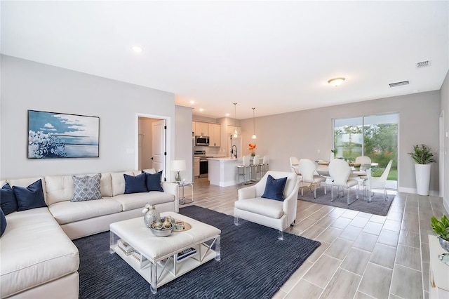 370 Marion Oaks Crse, Ocala, FL 34473 - living area featuring recessed lighting and baseboards