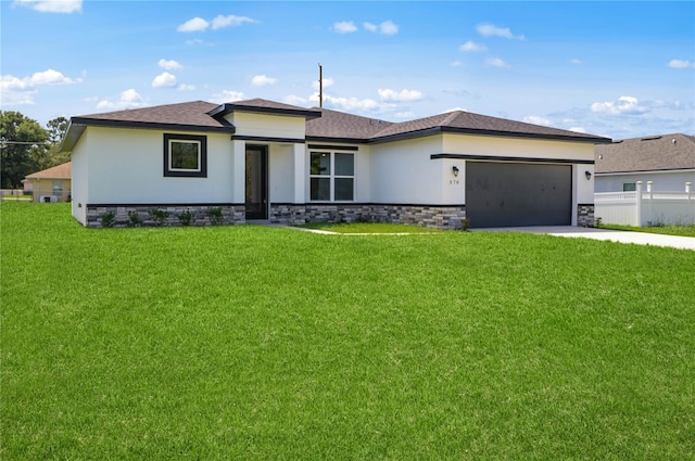 370 Marion Oaks Crse, Ocala, FL 34473 - prairie-style house with stucco siding, stone siding, driveway, and a garage