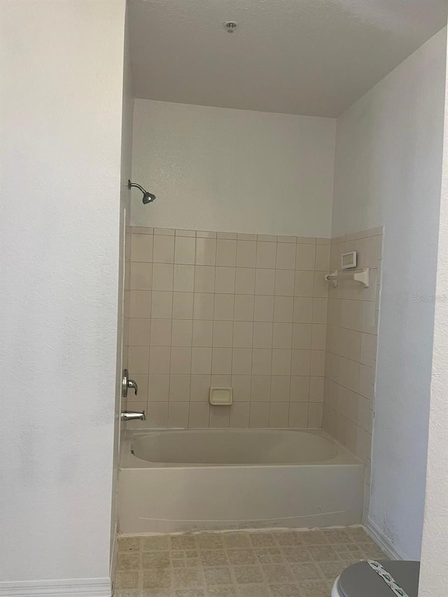 2314 Midtown Ter Unit 1113, Orlando, FL 32839 - full bath featuring baseboards, bathtub / shower combination, and toilet