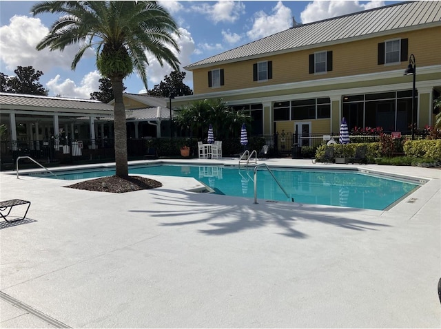 2314 Midtown Ter Unit 1113, Orlando, FL 32839 - pool featuring fence and a patio area