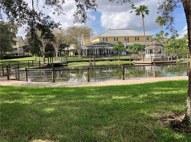 2314 Midtown Ter Unit 1113, Orlando, FL 32839 - view of property's community with a water view, a gazebo, and a yard