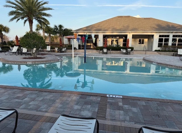 1907 Partin Terrace Rd, Kissimmee, FL 34744 - community pool with a patio area