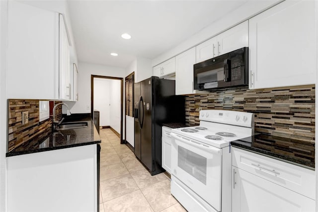 710 E Court, Longwood, FL 32750 - kitchen with white cabinetry, dark stone countertops, backsplash, a sink, and black appliances