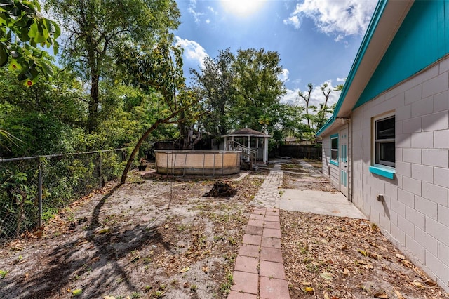 710 E Court, Longwood, FL 32750 - view of yard featuring a fenced backyard and a gazebo