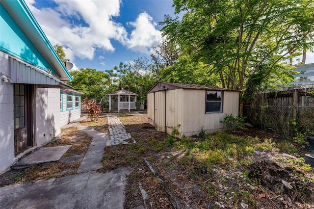 710 E Court, Longwood, FL 32750 - view of yard with an outbuilding, fence, a gazebo, and a shed