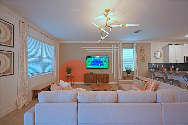 4221 Paragraph Dr, Kissimmee, FL 34746 - living room featuring plenty of natural light, baseboards, and visible vents