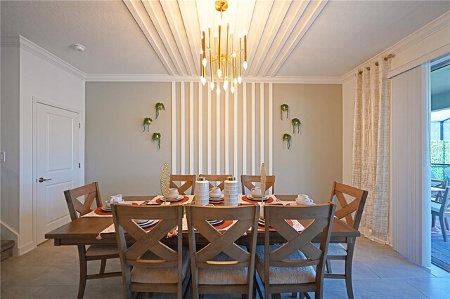 4221 Paragraph Dr, Kissimmee, FL 34746 - dining area featuring crown molding, a chandelier, and light tile patterned floors