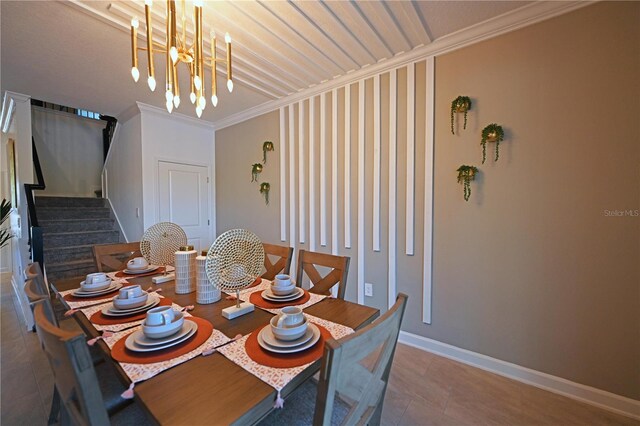 4221 Paragraph Dr, Kissimmee, FL 34746 - dining space featuring baseboards, crown molding, stairway, and a notable chandelier