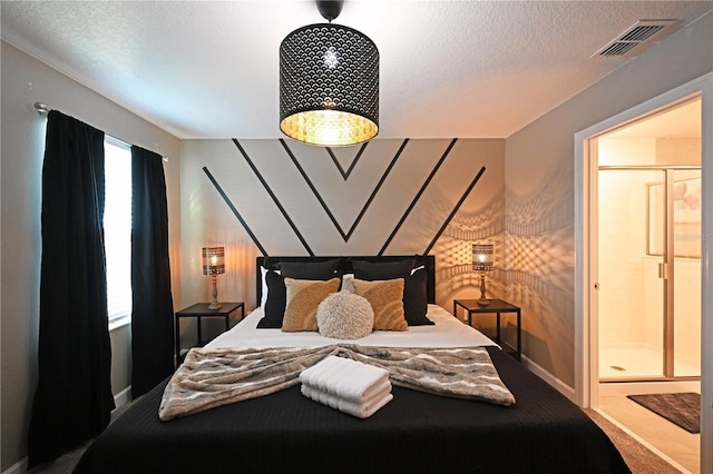 4221 Paragraph Dr, Kissimmee, FL 34746 - bedroom featuring baseboards, a textured ceiling, and visible vents