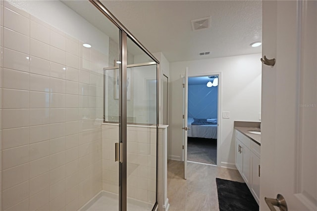 4221 Paragraph Dr, Kissimmee, FL 34746 - ensuite bathroom featuring connected bathroom, visible vents, and a stall shower