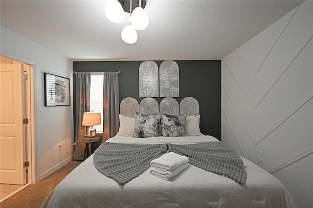 4221 Paragraph Dr, Kissimmee, FL 34746 - bedroom featuring carpet floors and a textured ceiling