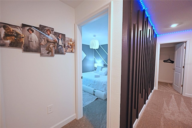 4221 Paragraph Dr, Kissimmee, FL 34746 - hall with baseboards and carpet