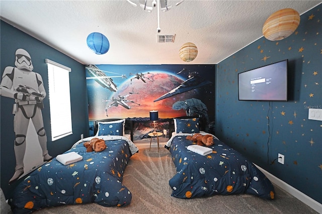4221 Paragraph Dr, Kissimmee, FL 34746 - carpeted bedroom with a textured ceiling, baseboards, and visible vents