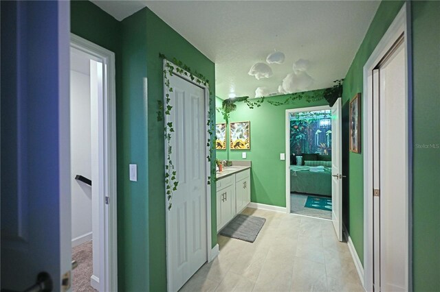 4221 Paragraph Dr, Kissimmee, FL 34746 - ensuite bathroom featuring ensuite bathroom, baseboards, and vanity