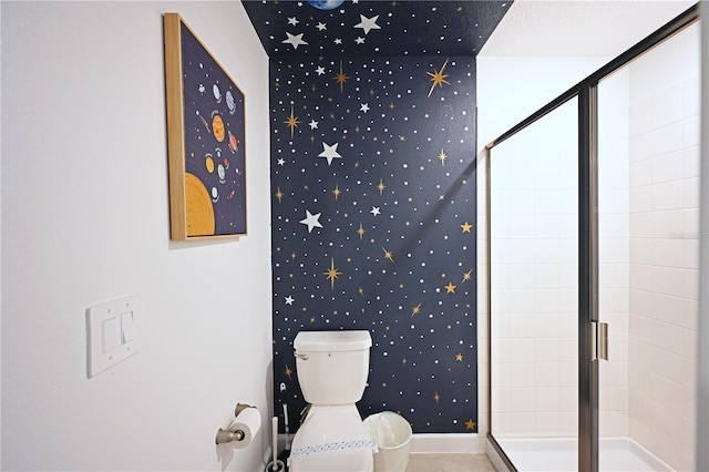 4221 Paragraph Dr, Kissimmee, FL 34746 - bathroom with wallpapered walls, toilet, and a shower stall