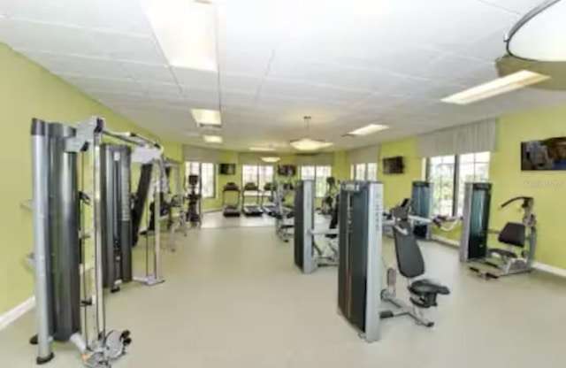 4221 Paragraph Dr, Kissimmee, FL 34746 - gym with baseboards and a drop ceiling