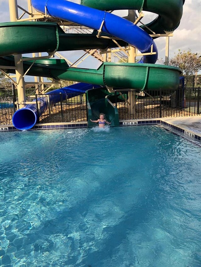 4221 Paragraph Dr, Kissimmee, FL 34746 - view of pool with fence
