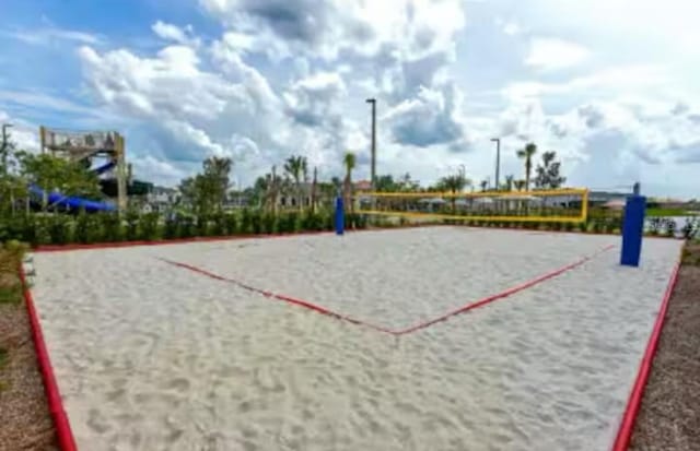 4221 Paragraph Dr, Kissimmee, FL 34746 - view of home's community with volleyball court