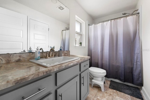 311 Athabasca Pl, Kissimmee, FL 34759 - full bath featuring visible vents, toilet, and vanity