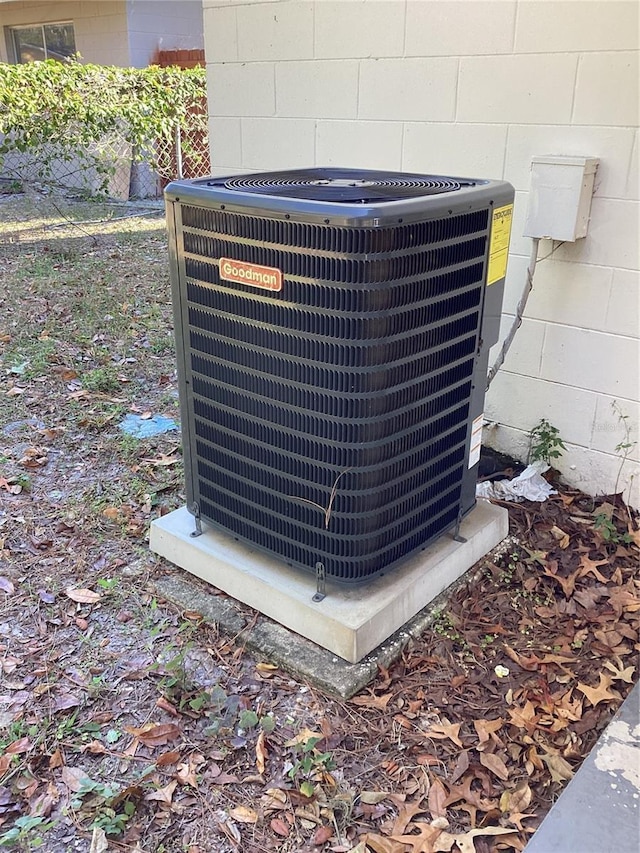2948 Willow Bend Blvd, Orlando, FL 32808 - details featuring central air condition unit, concrete block siding, and fence